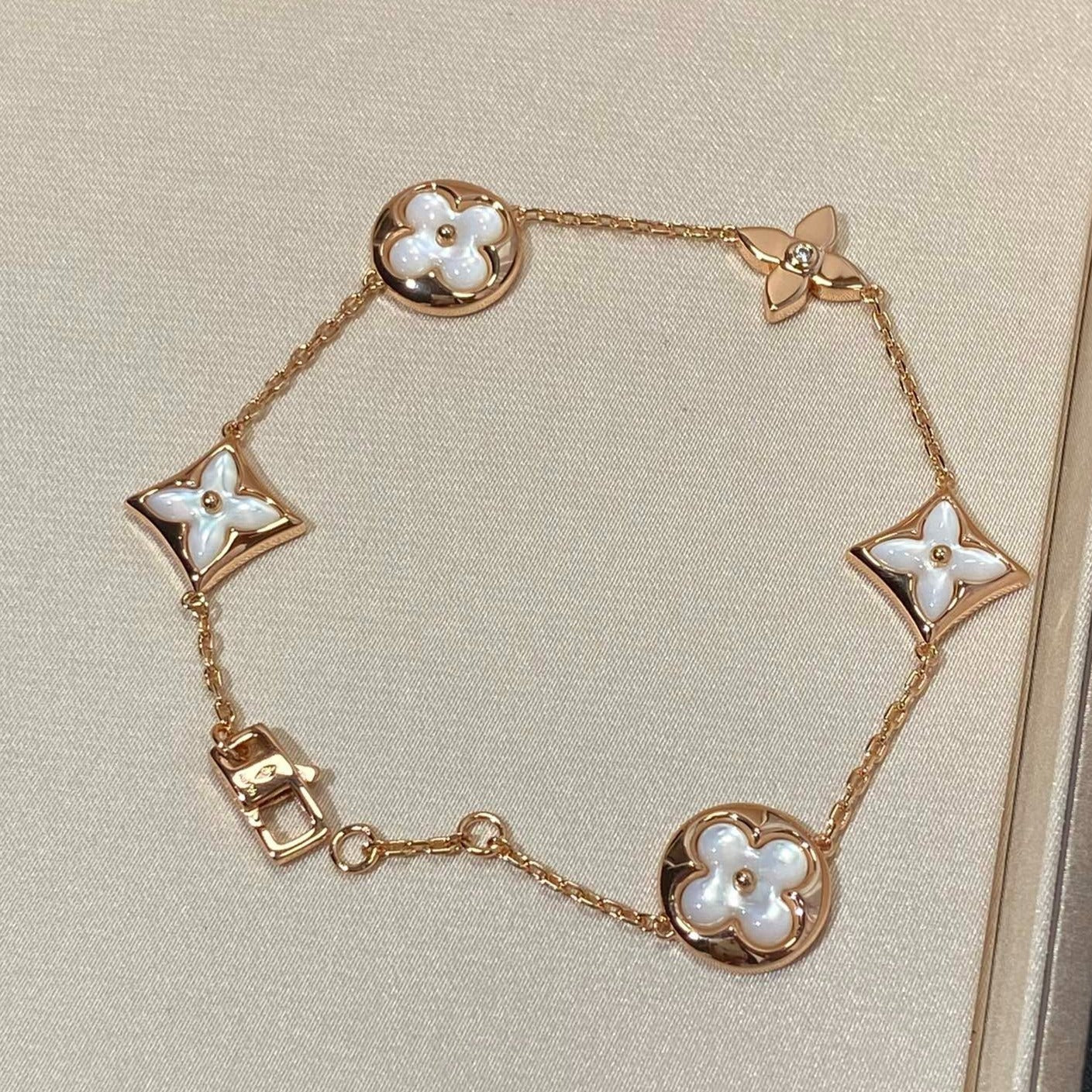 [AuraEcho]STAR AND SUN 5 MOTIF MOP PINK GOLD BRACELET