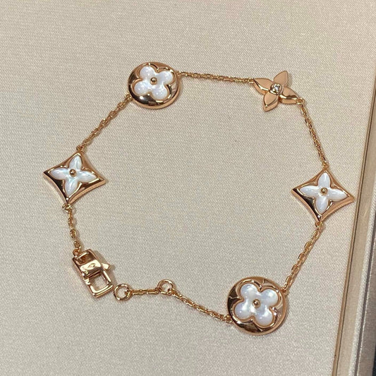 [AuraEcho]STAR AND SUN 5 MOTIF MOP PINK GOLD BRACELET