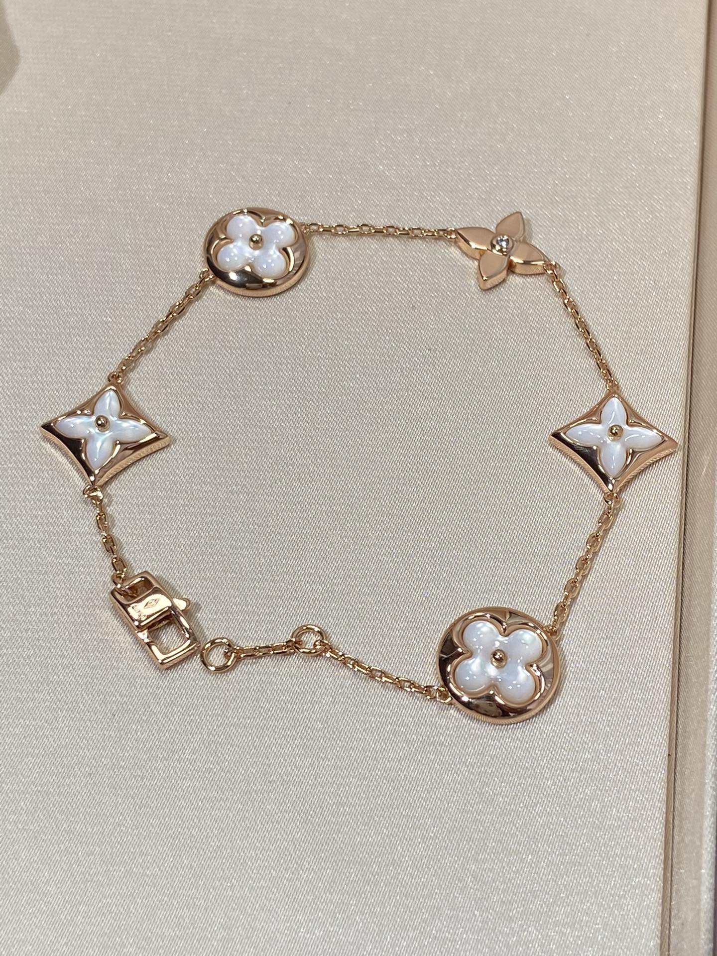 [AuraEcho]STAR AND SUN 5 MOTIF MOP PINK GOLD BRACELET