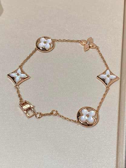 [AuraEcho]STAR AND SUN 5 MOTIF MOP PINK GOLD BRACELET